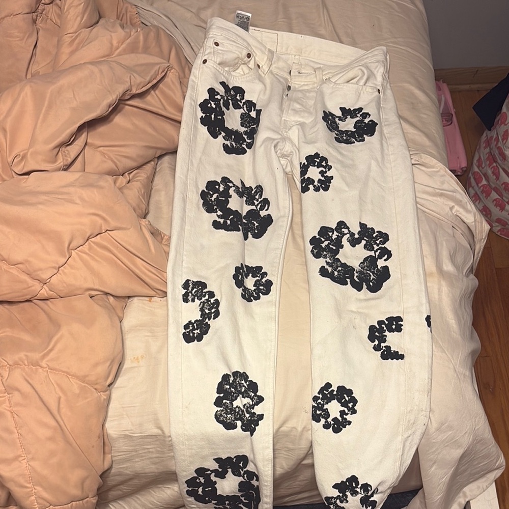 White and Black denim tears jeans